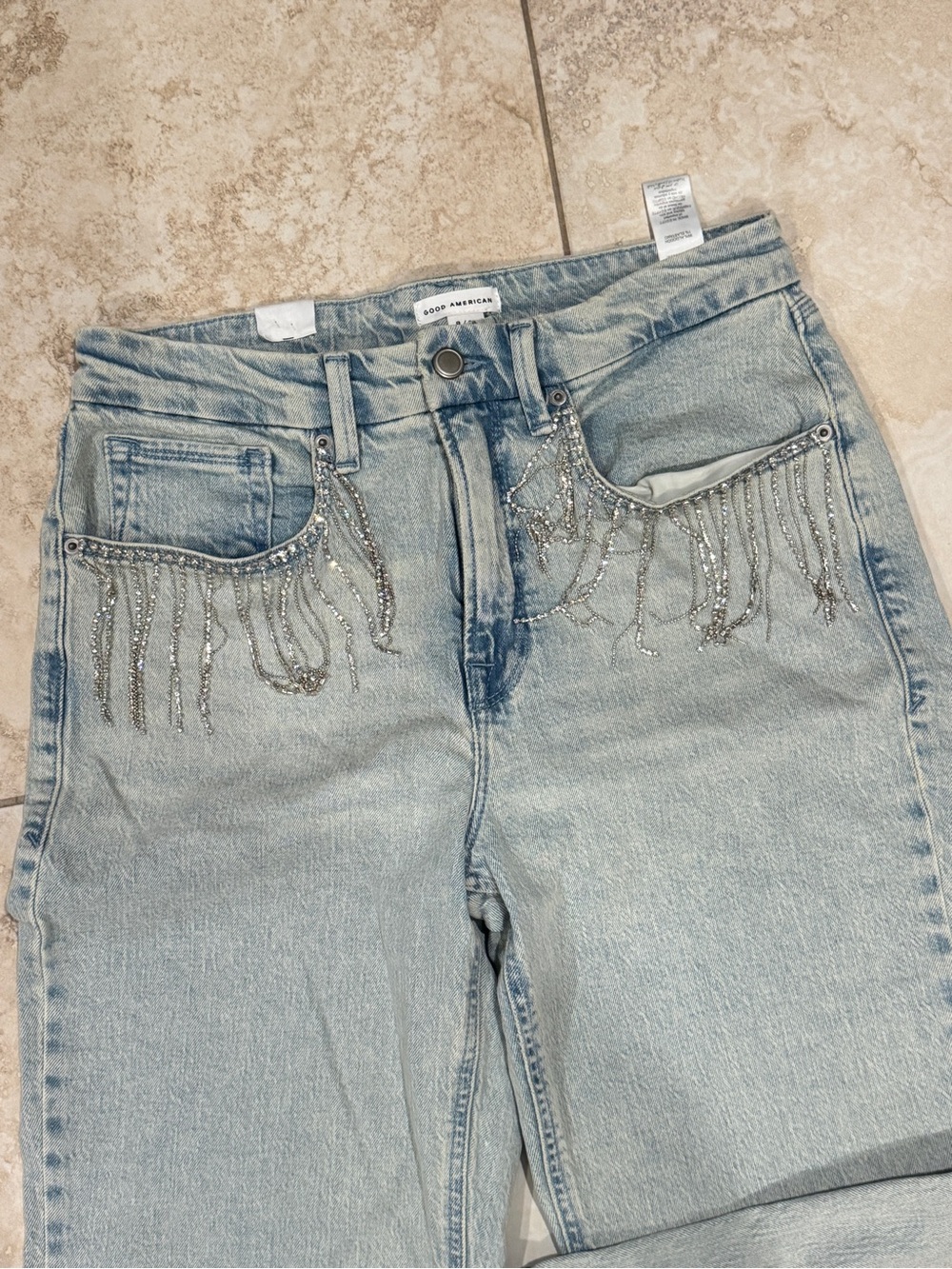 Good American Light Blue High-Rise Jeans with Silver Chain Fringe